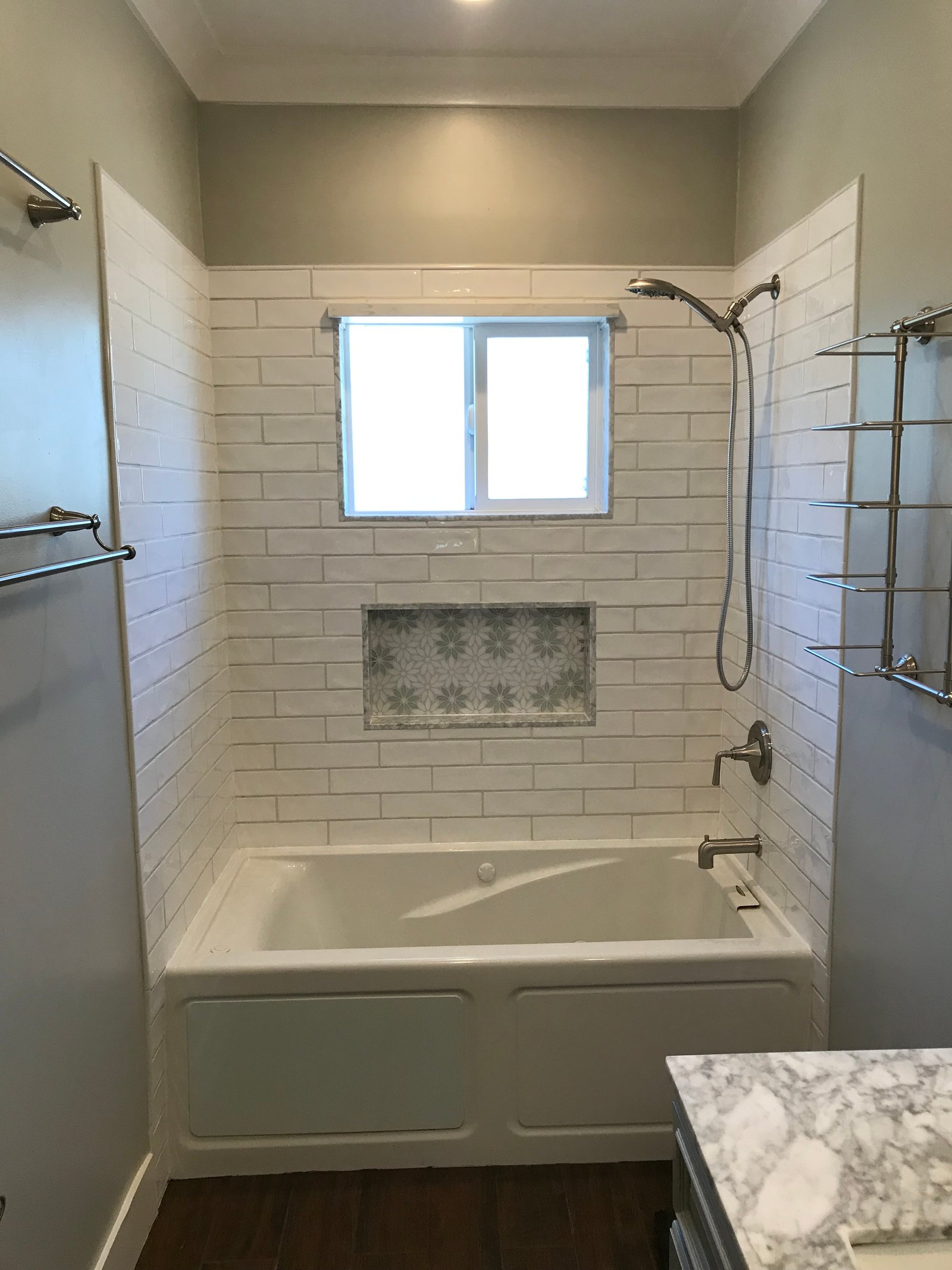 Craftsman inspecting marble vanity top alignment